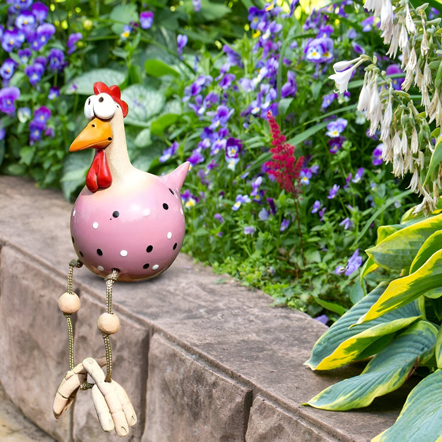 Grappige tuinkip met wiebelende poten - Tuindecoratie