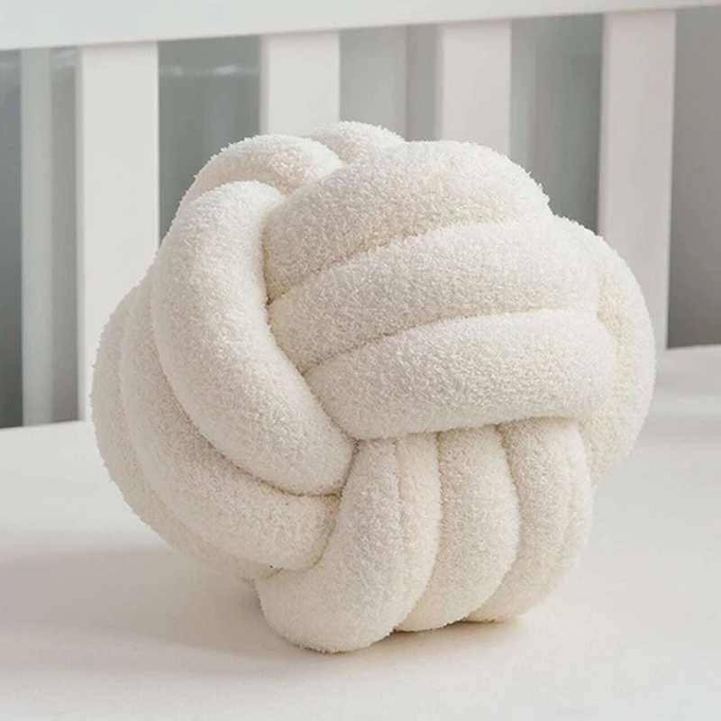 Knotta – Bouclé Knoopkussen voor Moderne Interieurs
